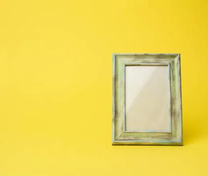 Empty rectangular blank wooden frame, yellow background empty rectangular ... Stock Photos