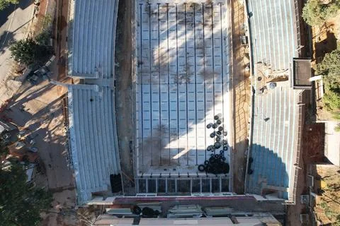 Empty rectangular blue swimming pool drone view. Stock Photos