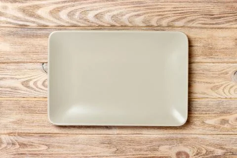 Empty rectangular Plate on wooden table background Foto stock