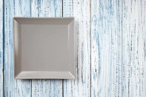 Empty rectangular Plate on wooden table background Stock Photos