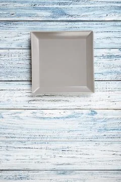 Empty rectangular Plate on wooden table background Stock Photos
