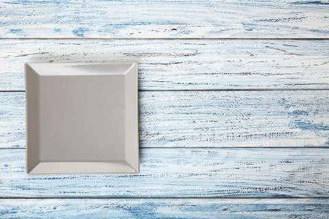 Empty rectangular Plate on wooden table background Stock-Fotos