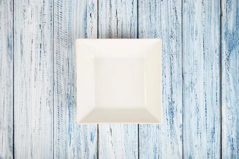 Empty rectangular Plate on wooden table background Stock Photos