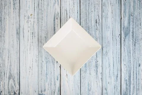 Empty rectangular Plate on wooden table background Stock Photos