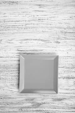 Empty rectangular Plate on wooden table background Stock Photos