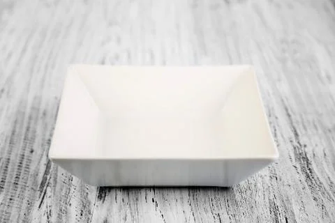 Empty rectangular Plate on wooden table background Stock Photos