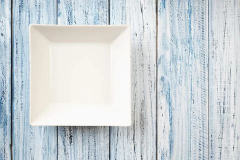 Empty rectangular Plate on wooden table background Stock Photos