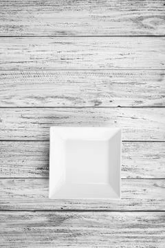Empty rectangular Plate on wooden table background Foto stock
