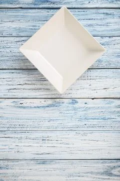 Empty rectangular Plate on wooden table background Stock Photos