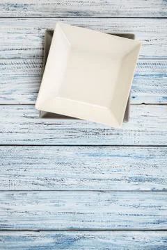 Empty rectangular Plate on wooden table background Stock Photos