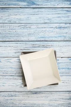 Empty rectangular Plate on wooden table background Stock Photos