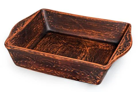 Empty rectangular red clay oven tray on a white background Stock Photos