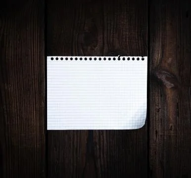 Empty rectangular white sheet torn out of notepad 스톡 사진