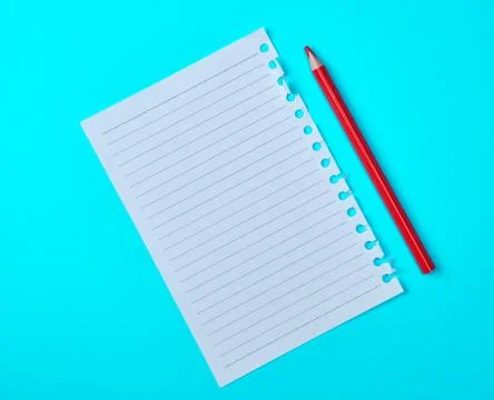 Empty rectangular white sheet torn out of notepad and wooden red pencil Stockfoto's