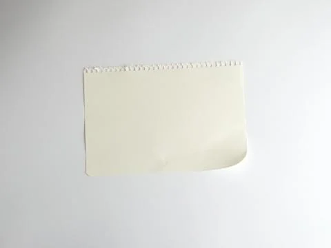 Empty rectangular white sheet torn out of notepad 스톡 사진