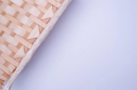 Empty rectangular wicker canister on a white background Stockfoto's