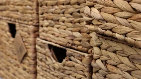 Empty rectangular wicker wooden storage baskets in a shop window Stock Footage 232855593