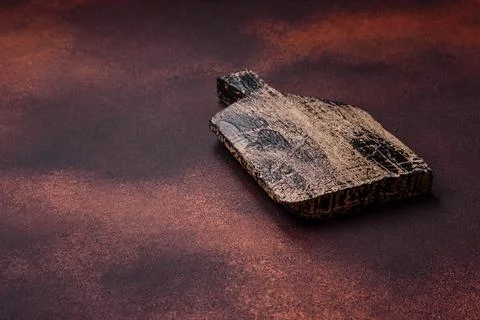 Empty rectangular wooden cutting board on textured concrete background Stock Photos