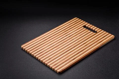 Empty rectangular wooden cutting board with copy space Stock Photos