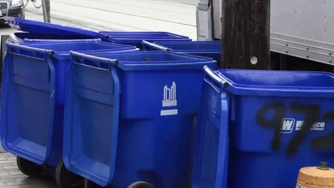 Empty recycling bins on curb Stock Footage 69186228