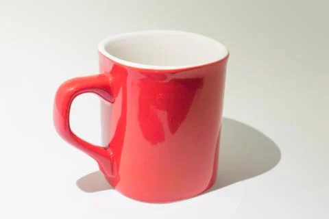 Empty red and white coffee cup on a white background Stock Photos