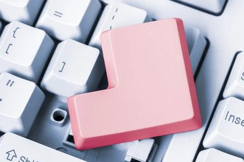 Empty red button removed from computer keyboard Stock Photos