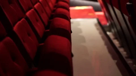 Empty red chair row in cinema theater Vídeos de archivo 70381990