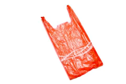 Empty red plastic bag isolated in clipping path. Stock Photos