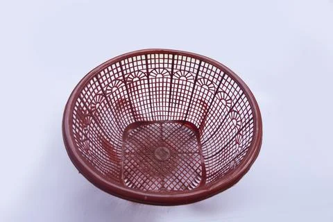 Empty Red Plastic Basket on White Background Stock Photos