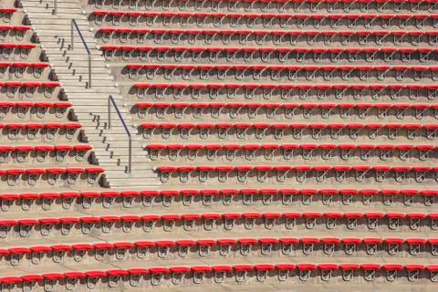 Empty red plastic chairs Stock Photos