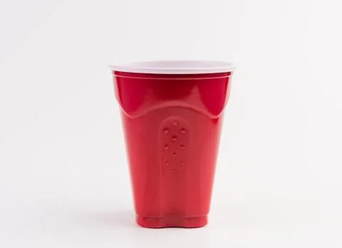Empty red plastic cup isolated on white Foto stock