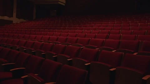 Empty red theater seats in auditorium Stock Footage 311963300