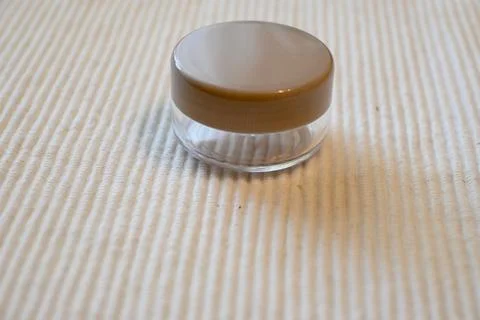 Empty Refillable Round Cosmetic Container for Travel on White Background, Copy S Fotos Stock