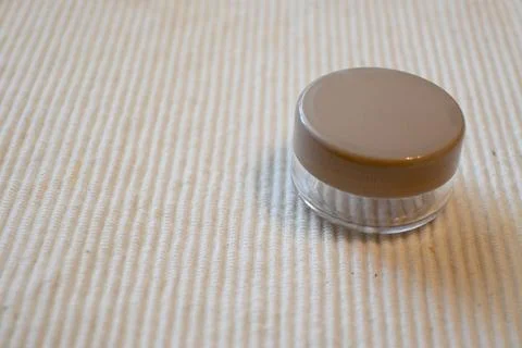 Empty Refillable Round Cosmetic Container for Travel on White Background, Copy S Stockfoto's