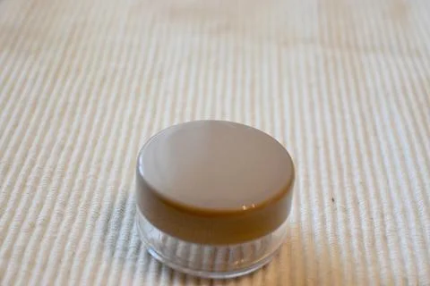 Empty Refillable Round Cosmetic Container for Travel on White Background, Copy S Fotos Stock