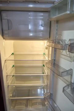 Empty Refrigerator Interior Offers Clean Fresh Space Stock Photos