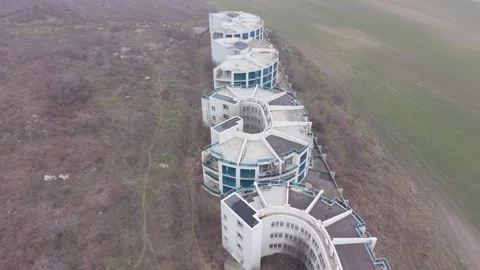 Empty residential complex with unfinished architecture captured from high drone Stock Footage 328828887