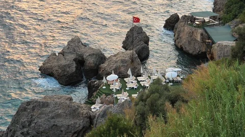 Empty restaurant on a cliff with the flag of Turkey. Stock Footage 129200206