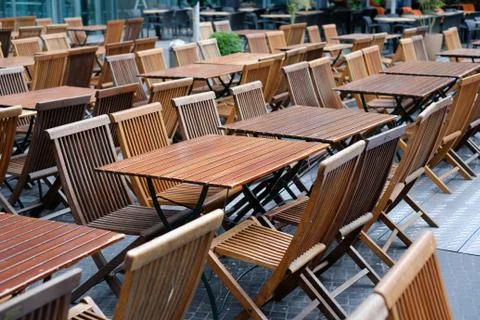 Empty restaurant, empty tables and chairs in restaurant on day off Stock Photos