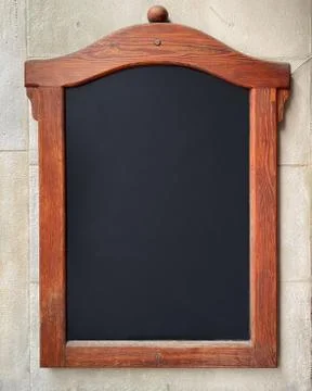 Empty restaurant menu board hanging on the wall Stock Photos