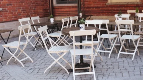 Empty restaurant or cafe in street at the brick house. Stock Footage 108725997