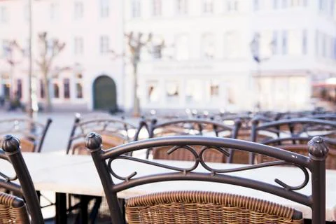 Empty restaurant or cafe with tables and chairs  because of coronavirus crisi Stock Photos