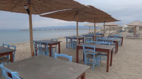 Empty restaurant by the sea on a cloudy evening. Stock Footage 161912408