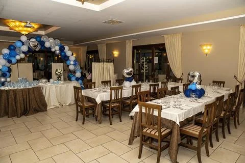 Empty restaurant set up for a baptism Foto stock