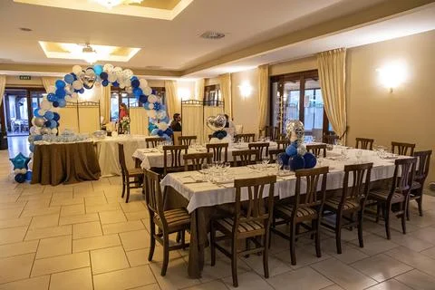 Empty restaurant set up for a baptism Foto stock