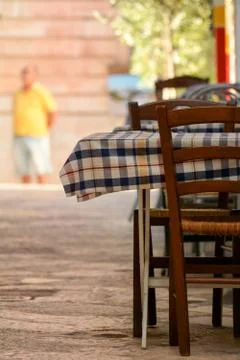 An empty restaurant table in the street 스톡 사진
