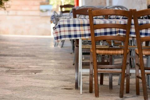An empty restaurant table in the street 스톡 사진