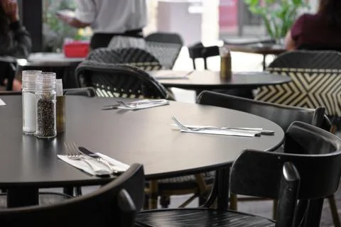 Empty restaurant table waiting for customers Stock Photos