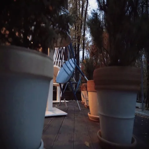 An empty restaurant terrace in the evening. Dolly shot. Stock Footage 69322771