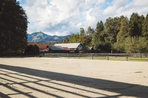 Empty riding ring at the horse ranch on a hot summer day Stock Photos